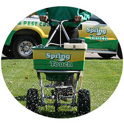 Blue Earth spring touch lawn and pest control company lawn truck
